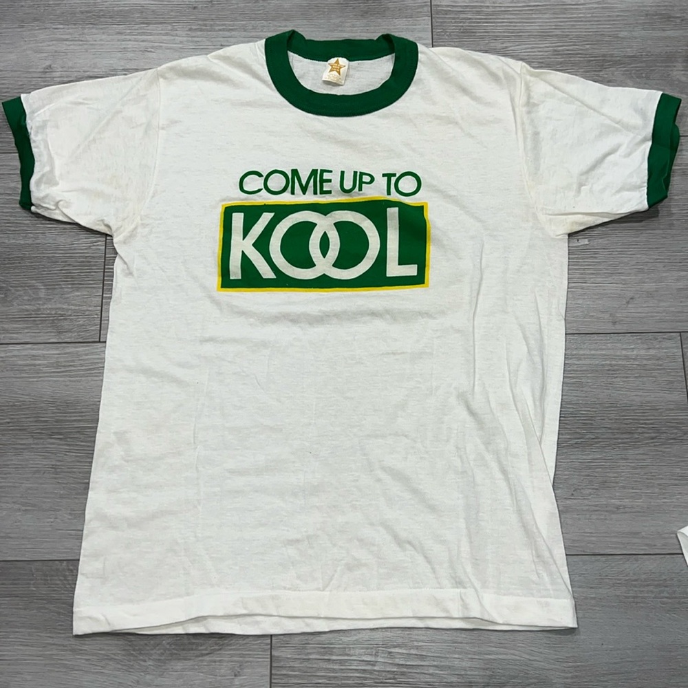 Center Star Knits
White and Green KOOL Menthol Cigarette Brand Ringer T-Shirt